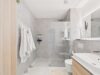 „Wohnen am Nockherberg“ Neuwertige 3-Zimmer-Wohnung mit hochwertiger Ausstattung und Weitblick - Elegantes Badezimmer mit Walk-In-Dusche