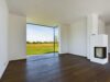 Exklusives Einfamilienhaus mit Designanspruch - Wohnzimmer mit Kamin