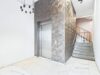 Exklusive 3-Zimmer-Wohnung mit Südwest-Balkon und Blick in den parkähnlichen Innenhof - Repräsentativer Eingangsbereich der Wohnanlage