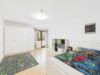 Energetisch zukunftssicher wohnen wie im Haus – exklusive 4,5-Zimmer-Wohnung mit PV & Wärmepumpe - Kinderzimmer mit Balkonzugang