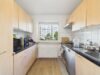 Vermietete 3-Zimmer-Kapitalanlage mit West-Balkon, Aufzug, zzgl. TG - Küche