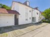 Wohnen, Investieren und Generationen vereinen – gepflegtes 3-Parteienhaus in attraktiver Lage - Außenansicht mit Duplex-Garage