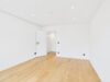 Wohnkomfort auf zwei Etagen – Elegante Maisonette mit Balkon - Wohnzimmer