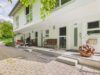 Lichtdurchflutetes Reihenendhaus mit Galerie und eingewachsenem Garten - Eingangsbereiche der Reihenhäuser