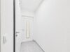 Stilvolles Reihenendhaus mit offener Galerie und sonnigem Garten - Funktionaler Eingangsbereich