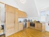 Lichtdurchflutete Galeriewohnung mit beeindruckender Raumhöhe und Maisonette-Charakter - Kochen