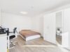 Modernes Erdgeschossglück mit Privatgarten und Tiefgaragenstellplatz - Schlafzimmer