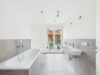 Exklusive Neubau-Doppelhaushälfte | Zeitlose Architektur & hochwertiger Wohnkomfort - Badezimmer im 1. Obergeschoss