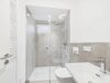 Exklusive Neubau-Doppelhaushälfte | Zeitlose Architektur & hochwertiger Wohnkomfort - Badezimmer im Untergeschoss