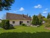 250 m² Wohnvielfalt auf 1.600 m², Pool, Traumgarten und Platz für große Pläne – Bieterverfahren - Gartenansicht Terrasse und Brunnen
