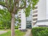 Vermietetes 1-Zimmer-Apartment mit großem Balkon und Weitblick in Unterhaching - Eingang Gebäude