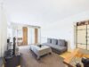 Vermietetes 1-Zimmer-Apartment mit großem Balkon und Weitblick in Unterhaching - Wohnbereich