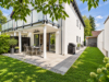 Exklusive 4-Zimmer-Gartenwohnung mit großem Privatgarten und attraktivem Souterrain - Gepflegter Privatgarten mit sonniger, überdachten Terrasse