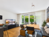 Exklusive 4-Zimmer-Gartenwohnung mit großem Privatgarten und attraktivem Souterrain - Heller, stilvoller Essbereich mit bodentiefen Fenstern und direktem Gartenzugang