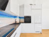 Neuwertige 2-Zimmer-Wohnung mit großzügigem Südbalkon - Elegante Kontraste und durchdachte Küchenausstattung (Virtuell geräumt)