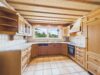 Wohnen mit besonderem Charakter – Charmantes 5-Zimmer-Split-Level-Haus mit idyllischem Garten - Küche