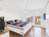Großzügige 4-Zimmer-Wohnung mit Balkon und privatem Gartenanteil - Schlafzimmer