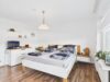 Großzügige 4-Zimmer-Wohnung mit Balkon und privatem Gartenanteil - Schlafzimmer