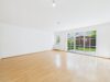 Charmante 3-Zimmer-Gartenwohnung in begehrter Münchner Wohnlage - Wohnzimmer