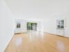 Charmante 3-Zimmer-Gartenwohnung in begehrter Münchner Wohnlage - Wohnzimmer