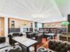 Möbliert vermietetes Apartment mit Zugang zu Fitnessstudio, Pool, Sauna & mehr - Bibliothek Ansicht I