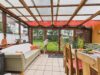 Charmantes Eckhaus mit Erweiterungspotenzial auf großem Grundstück - Wintergarten mit angrenzender Terrasse