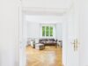 Altbaucharme trifft Gartenidylle: 5-Zimmer-Wohnung am Schlosskanal - Wohnzimmer mit Doppeltür