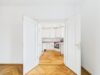 Altbaucharme trifft Gartenidylle: 5-Zimmer-Wohnung am Schlosskanal - Küche mit Doppeltür