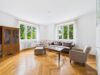 Altbaucharme trifft Gartenidylle: 5-Zimmer-Wohnung am Schlosskanal - Wohnzimmer