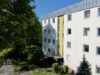 Charmante 2-Zimmer-Wohnung mit Westbalkon in Aubing - Hausansicht