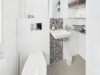 Stilvoll wohnen auf zwei Etagen – Maisonette mit Garten, Kamin, Designküche und mehr in Heimstetten - Gäste WC