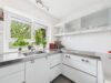 Stilvoll wohnen auf zwei Etagen – Maisonette mit Garten, Kamin, Designküche und mehr in Heimstetten - Küche