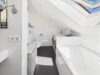 Stilvoll wohnen auf zwei Etagen – Maisonette mit Garten, Kamin, Designküche und mehr in Heimstetten - Wanne / Hauswirtschaftsbereich