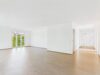 Licht, Raum und Stil – Ihre neue 3-Zimmer-Wohnung mit Blick ins Grüne - Wohnzimmer mit Fluransicht
