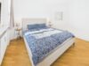 Moderne 2-Zimmer-Wohnung mit Aufzug, Balkon und Tiefgarage in Nymphenburg - Schlafbereich