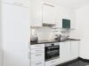 Moderne 2-Zimmer-Wohnung mit Aufzug, Balkon und Tiefgarage in Nymphenburg - Küche