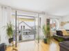 Zeitlose Eleganz trifft auf modernen Wohnkomfort - Blick zum Balkon