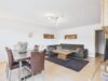 Gepflegte 4-Zimmer-Wohnung mit Balkon, eigenem Garten - Wohnzimmer