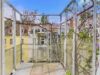 Haidhausen: Stilvolle Altbauwohnung mit Süd-Balkon, Aufzug & großem Entwicklungspotenzial - Balkon in den Innenhof