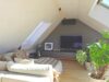 Luxus und Individualität, Design-Maisonette in Alt-Bogenhausen - Wohnzimmer (Galerie) mit großem Cabriofenster